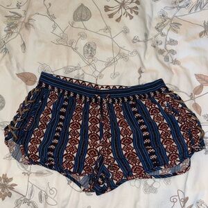 Forever 21 tribal design soft shorts. Soft and thin leather crossed on each side
